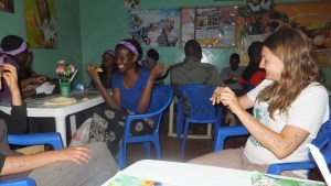 The ICS volunteers socialize together, forced inside by a downpour while picking up garbage